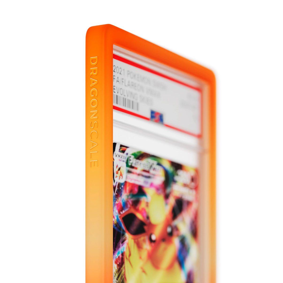 Close up logo zoom view of a PSA slab in Gradient Blaze Dragonscale bumper guard, featuring a Flareon VMAX Evolving Skies PSA 10 Pokemon card.