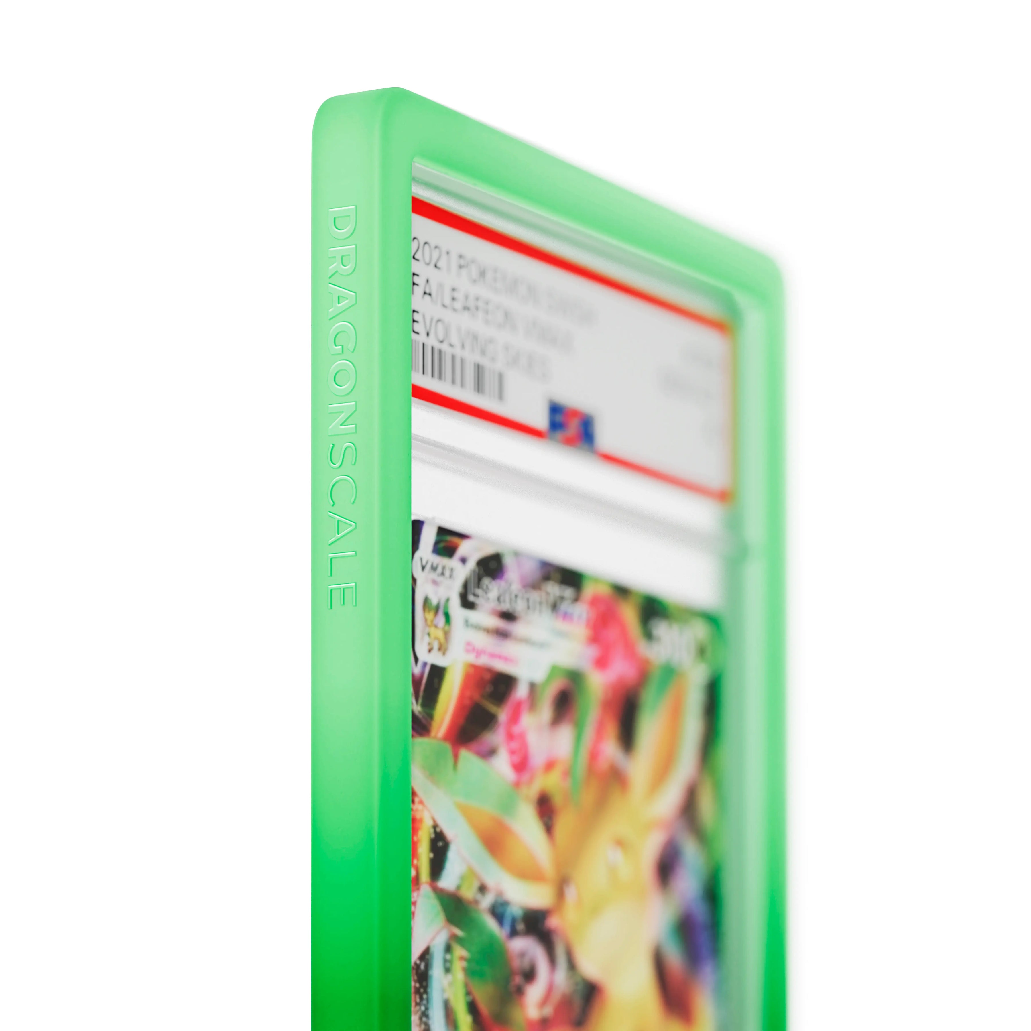 Close up logo zoom view of a PSA slab in Gradient Blaze Dragonscale bumper guard, featuring a Leafeon VMAX Evolving Skies PSA 10 Pokemon card.