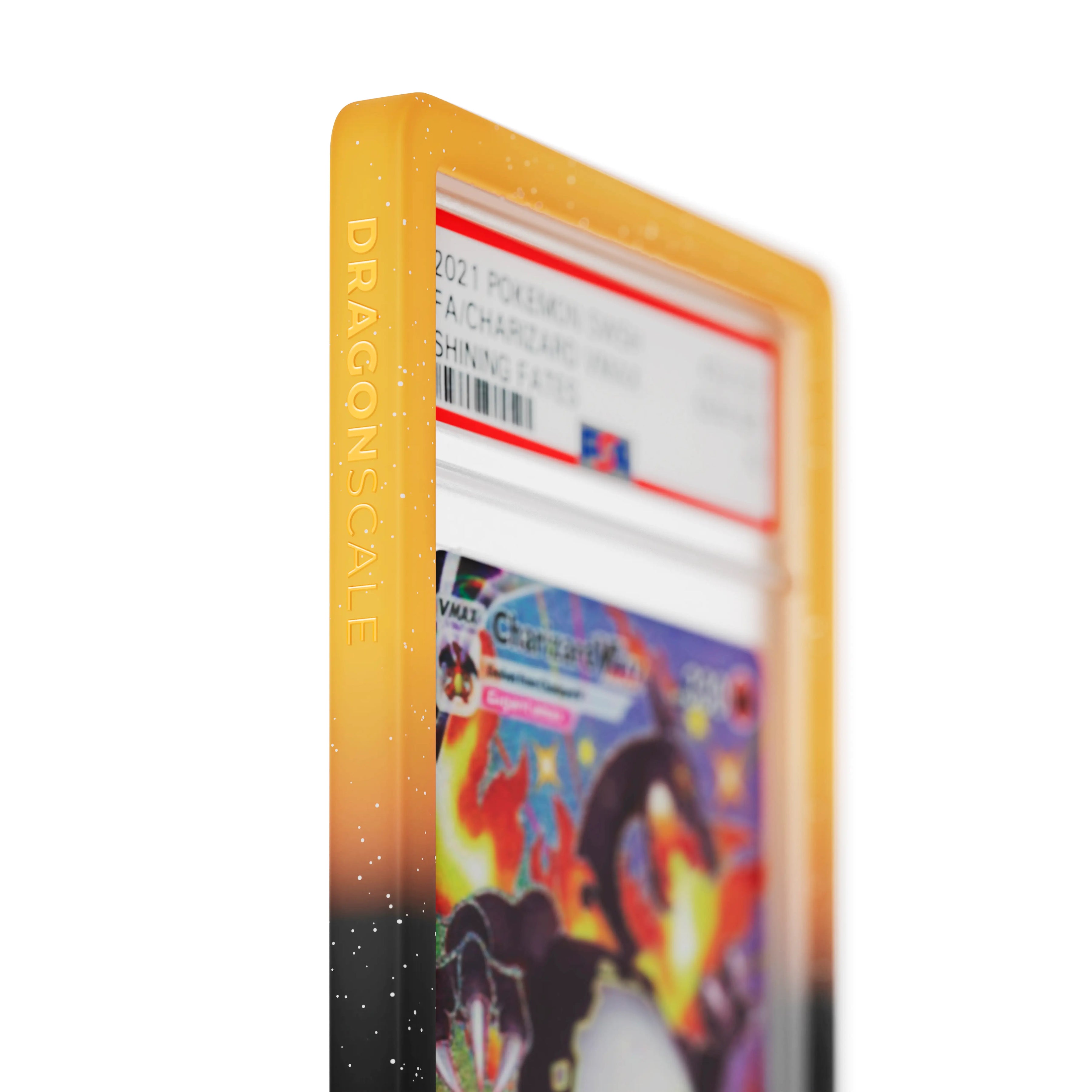 Close up logo zoom view of a PSA slab in Radiant Magma Dragonscale bumper guard, featuring a Charizard VMAX Shining Fates PSA 10 Pokemon card.