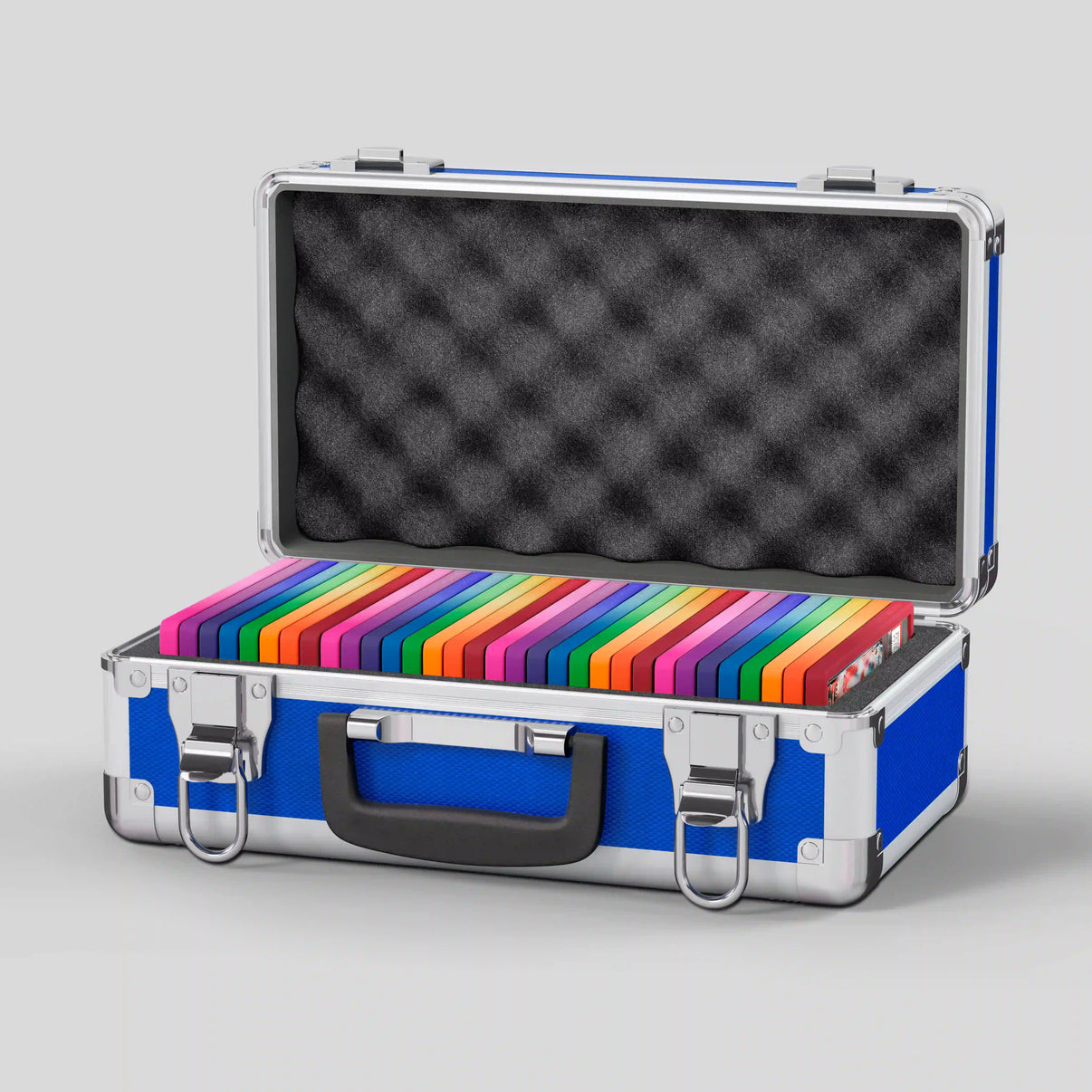 Open view of the Dragonscale Basilisk X-40 Compact metal slab case in sapphire blue holding 32 PSA slabs with Dragonscale guards.