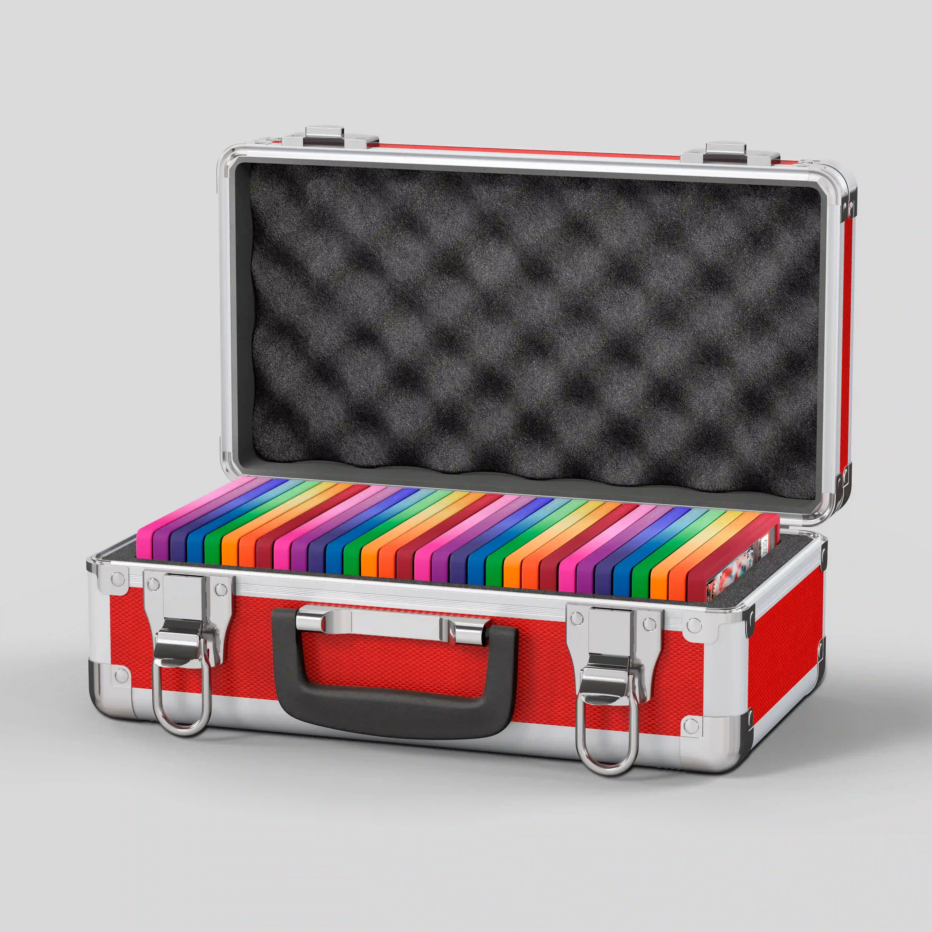Open view of the Dragonscale Basilisk X-40 Compact metal slab case in ruby red holding 32 PSA slabs with Dragonscale guards.