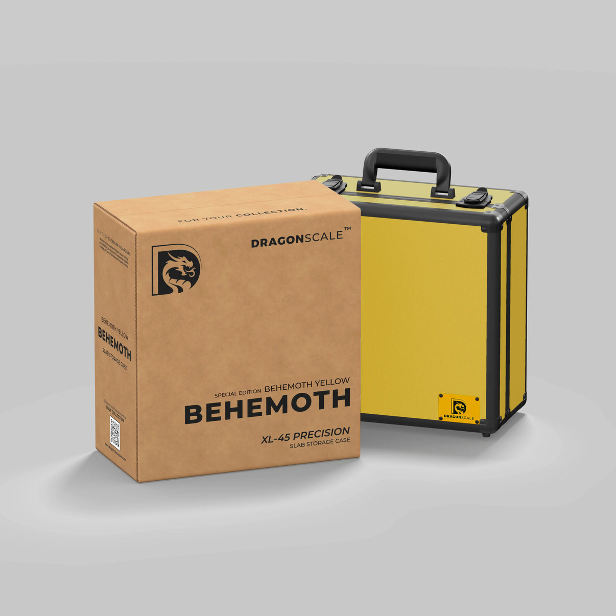 Display and demo view of the Dragonscale Behemoth XL-45 metal slab case in yellow, placed on top of its branded cardboard packaging box.