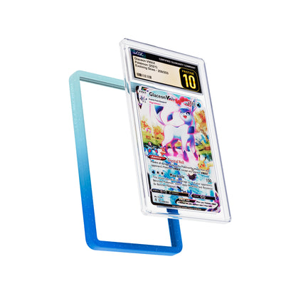Display and demo view of a CGC slab in Radiant Aqua Dragonscale bumper guard, featuring a Glaceon VMAX Evolving Skies CGC 10 Pokemon card.