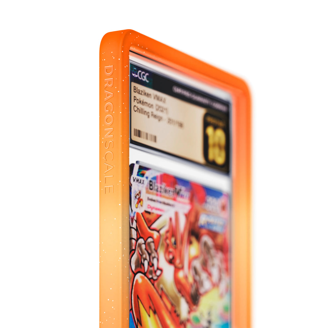 Close up logo zoom view of a CGC slab in Radiant Blaze Dragonscale bumper guard, featuring a Blaziken VMAX Chilling Reign CGC 10 Pokemon card.
