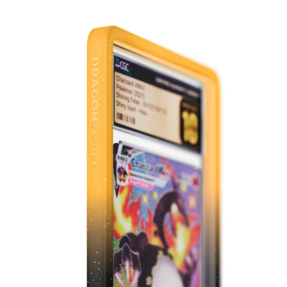 Close up logo zoom view of a CGC slab in Radiant Magma Dragonscale bumper guard, featuring a Charizard VMAX Shining Fates CGC 10 Pokemon card.
