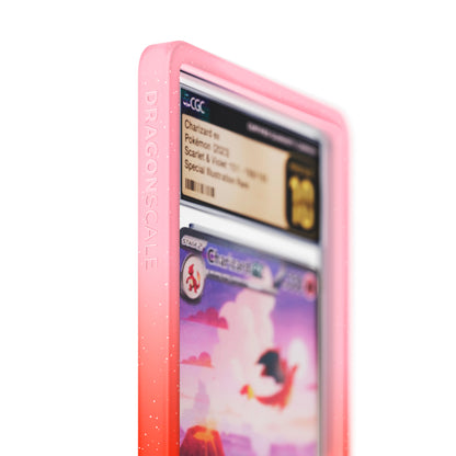 Close up logo zoom view of a CGC slab in Radiant Phoenix Dragonscale bumper guard, featuring a Charizard EX Mew 151 CGC 10 Pokemon card.
