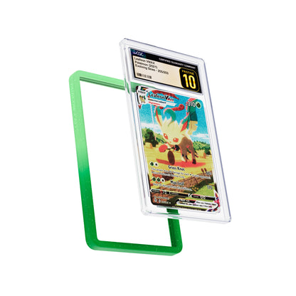 Display and demo view of a CGC slab in Radiant Verdant Dragonscale bumper guard, featuring a Leafeon VMAX Evolving Skies CGC 10 Pokemon card.