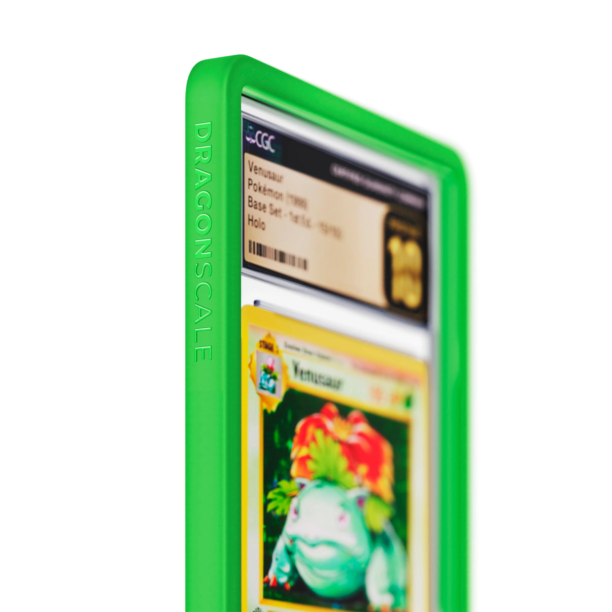 Close up logo zoom view of a CGC slab in Solid Green Dragonscale bumper guard, featuring a Venusaur 1st Edition Base Set CGC 10 Pokemon card.
