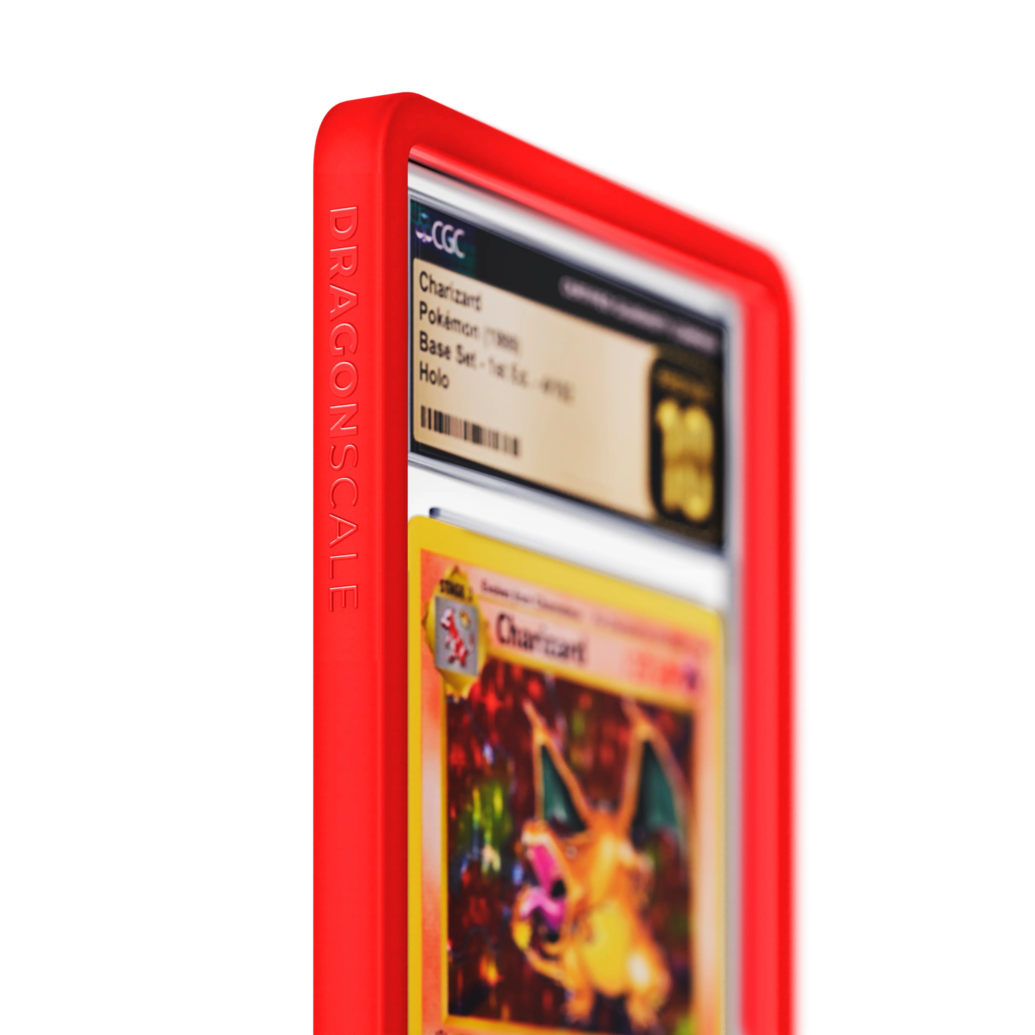 Close up logo zoom view of a CGC slab in Solid Red Dragonscale bumper guard, featuring a Charizard 1st Edition Base Set CGC 10 Pokemon card.
