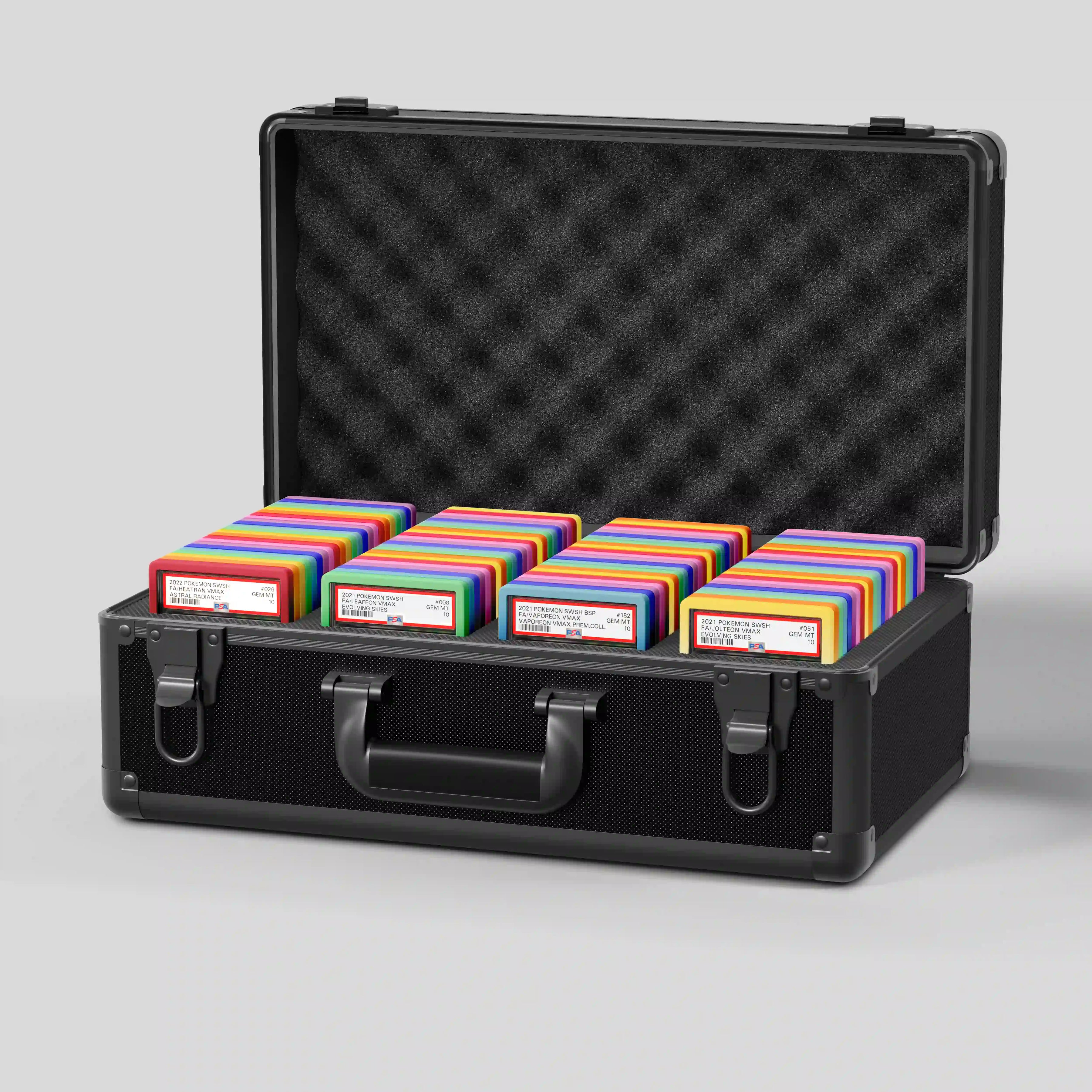 Open view of the Dragonscale Leviathan XL-130 Compact metal slab case in carbon black holding 130+ PSA-Sized Slabs / 85+ BGS-Sized Slabs with Dragonscale guards.