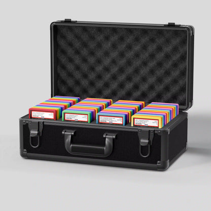 Open view of the Dragonscale Leviathan XL-130 Compact metal slab case in carbon black holding 130+ PSA-Sized Slabs / 85+ BGS-Sized Slabs with Dragonscale guards.