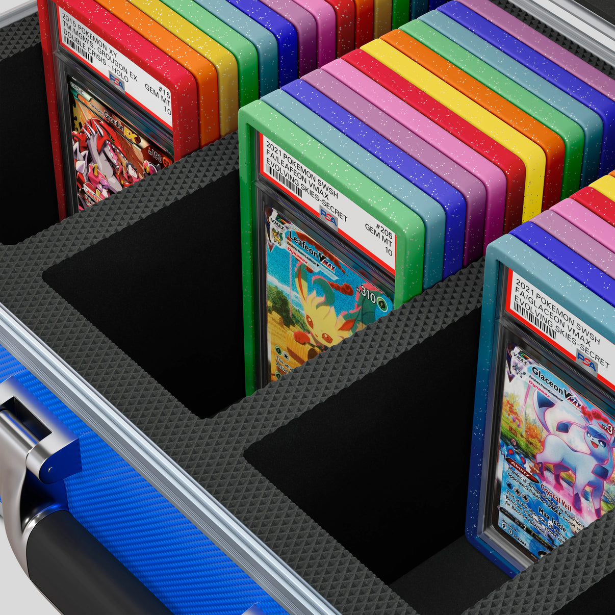 Close-up of the  Dragonscale Leviathan XL-130 Compact metal slab case in leviathan blue foam slot securely holding PSA slabs with Dragonscale guards.