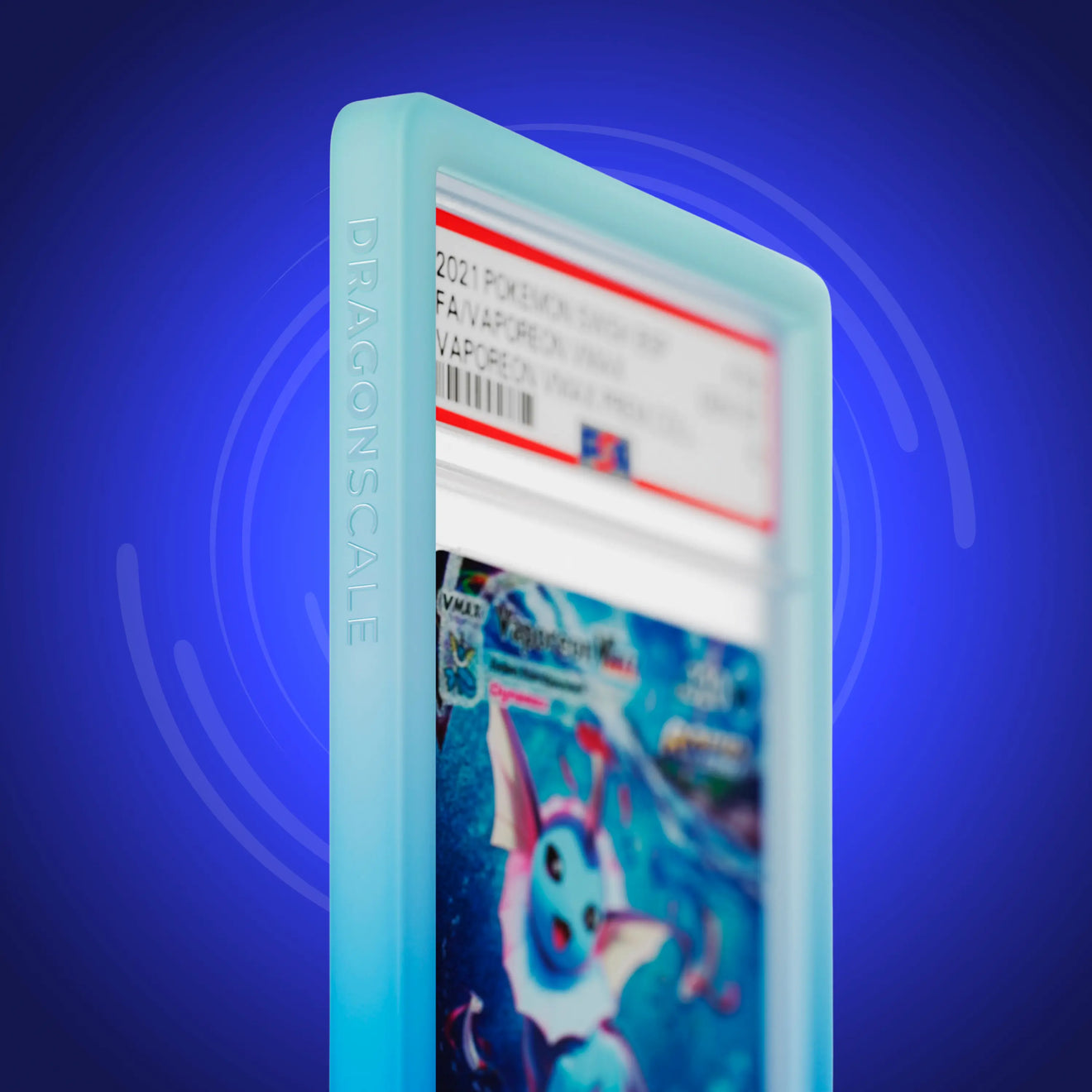 Close up logo zoom view of a PSA slab in Gradient Aqua Dragonscale bumper guard, featuring a Vaporeon VMAX Sword & Shield PSA 10 Pokemon card.