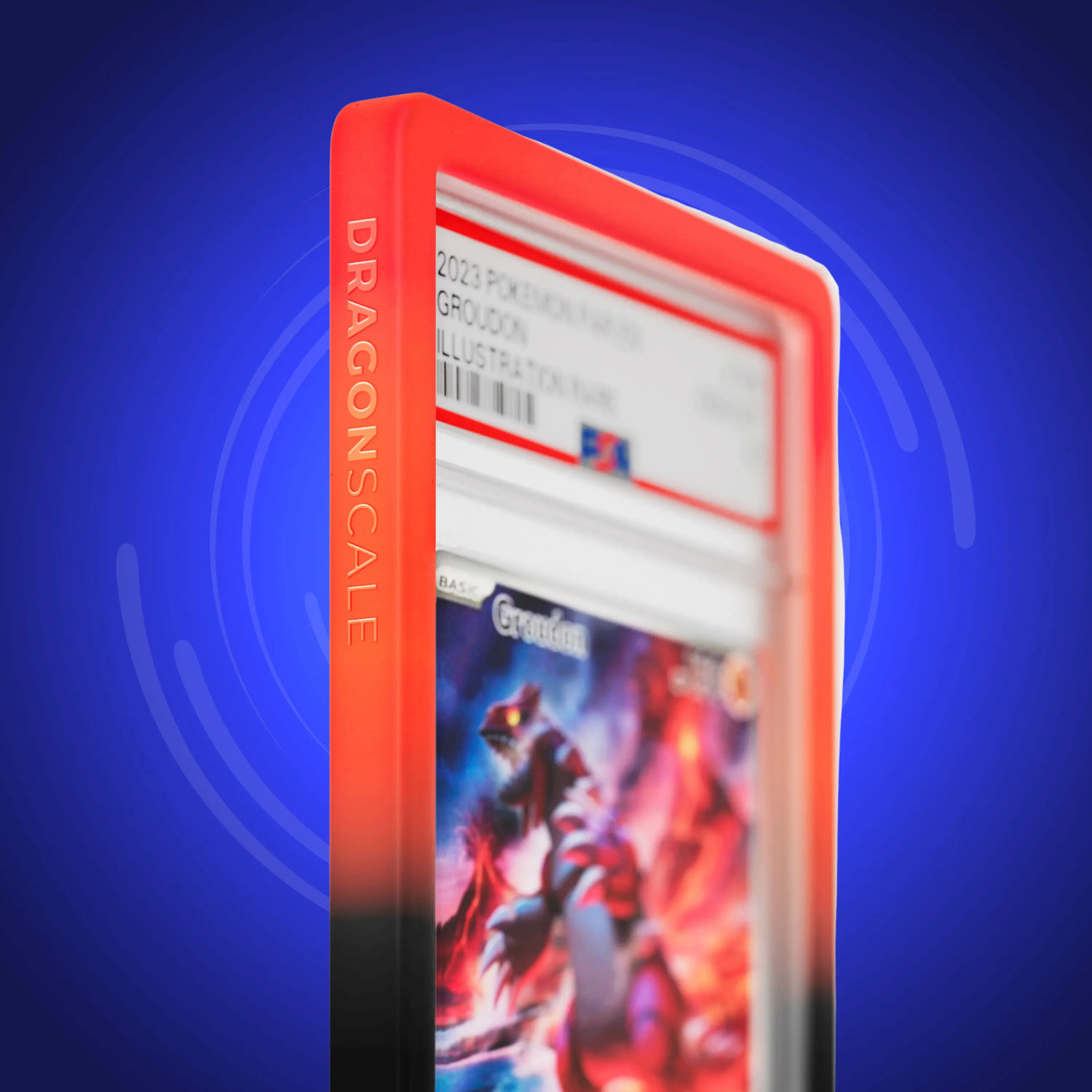 Close up logo zoom view of a PSA slab in Gradient Infernal Dragonscale bumper guard, featuring a Groudon Paradox Rift PSA 10 Pokemon card.