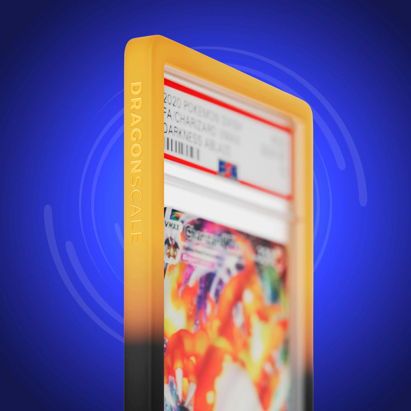 Close up logo zoom view of a PSA slab in Gradient Magma Dragonscale bumper guard, featuring a Charizard VMAX Darkness Ablaze PSA 10 Pokemon card.