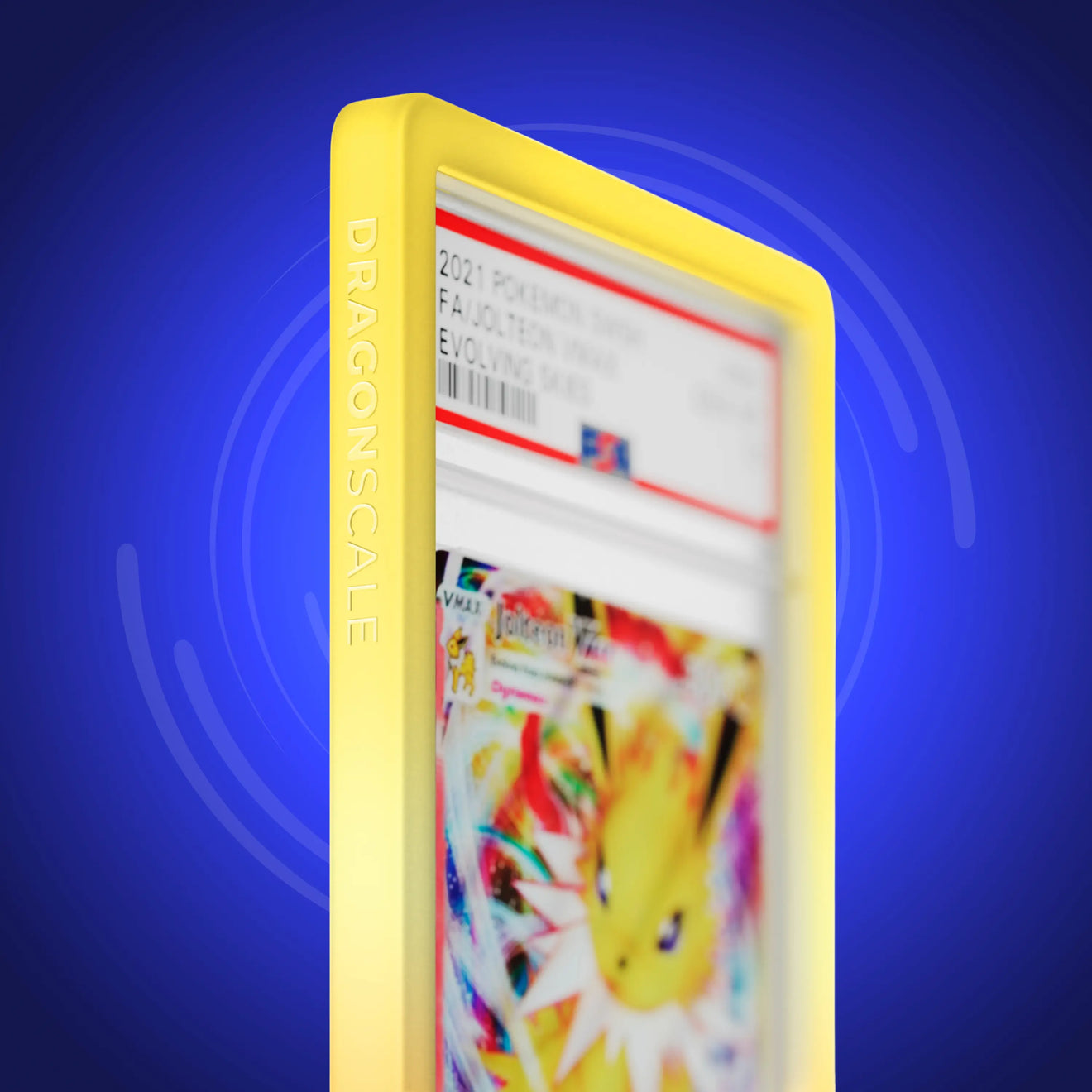 Close up logo zoom view of a PSA slab in Gradient Solar Dragonscale bumper guard, featuring a Jolteon VMAX Evolving Skies PSA 10 Pokemon card.