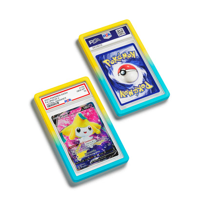 Top-down flat view of a PSA slab in Gradient Wish Dragonscale bumper guard, featuring a Jirachi V Astral Radiance PSA 10 Pokemon card.