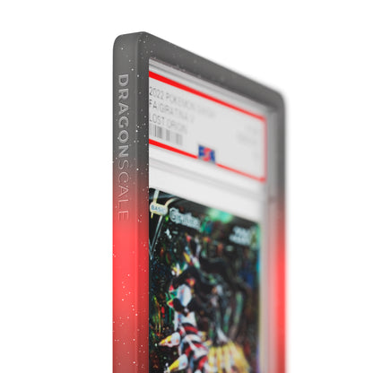 Close up logo zoom view of a PSA slab in Mythic Corruption Dragonscale bumper guard, featuring a Giratina V Lost Origin PSA 10 Pokemon card.
