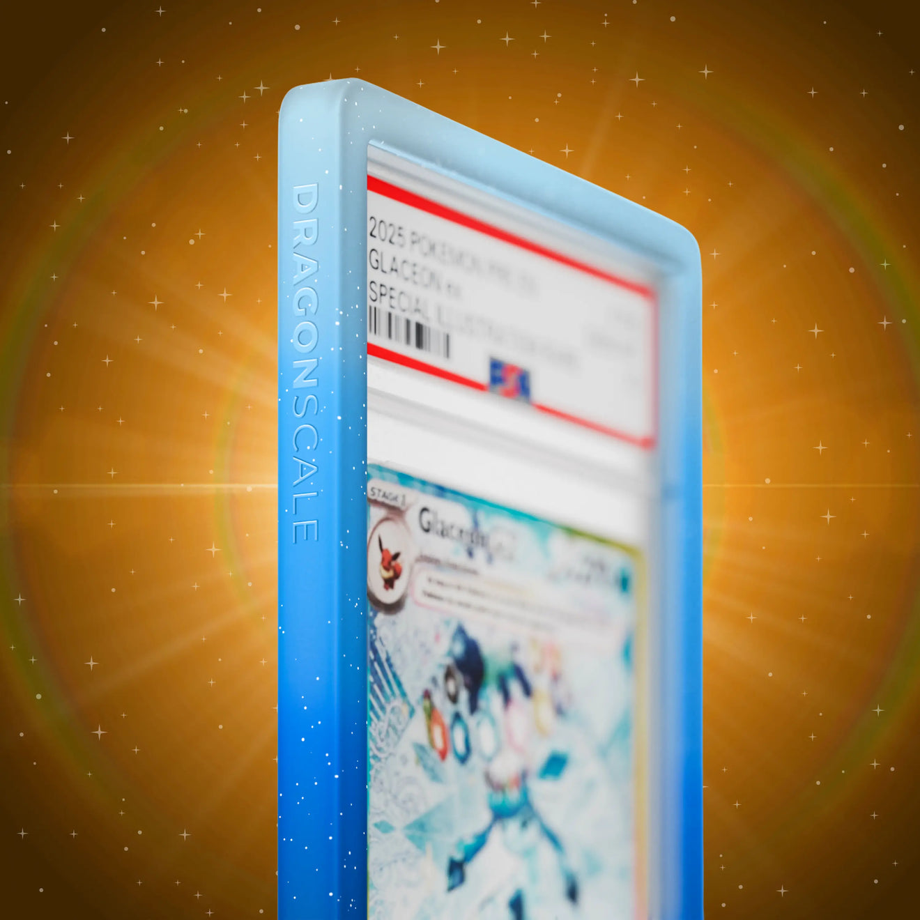 Close up logo zoom view of a PSA slab in Mythic Permafrost Dragonscale bumper guard, featuring a Glaceon Ex Prismatic Evolution PSA 10 Pokemon card.