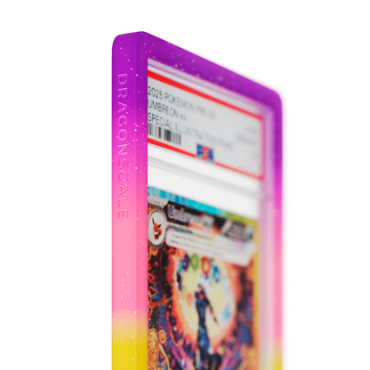 Close up logo zoom view of a PSA slab in Mythic Supernova Dragonscale bumper guard, featuring a Umbreon Ex Prismatic Evolution PSA 10 Pokemon card.