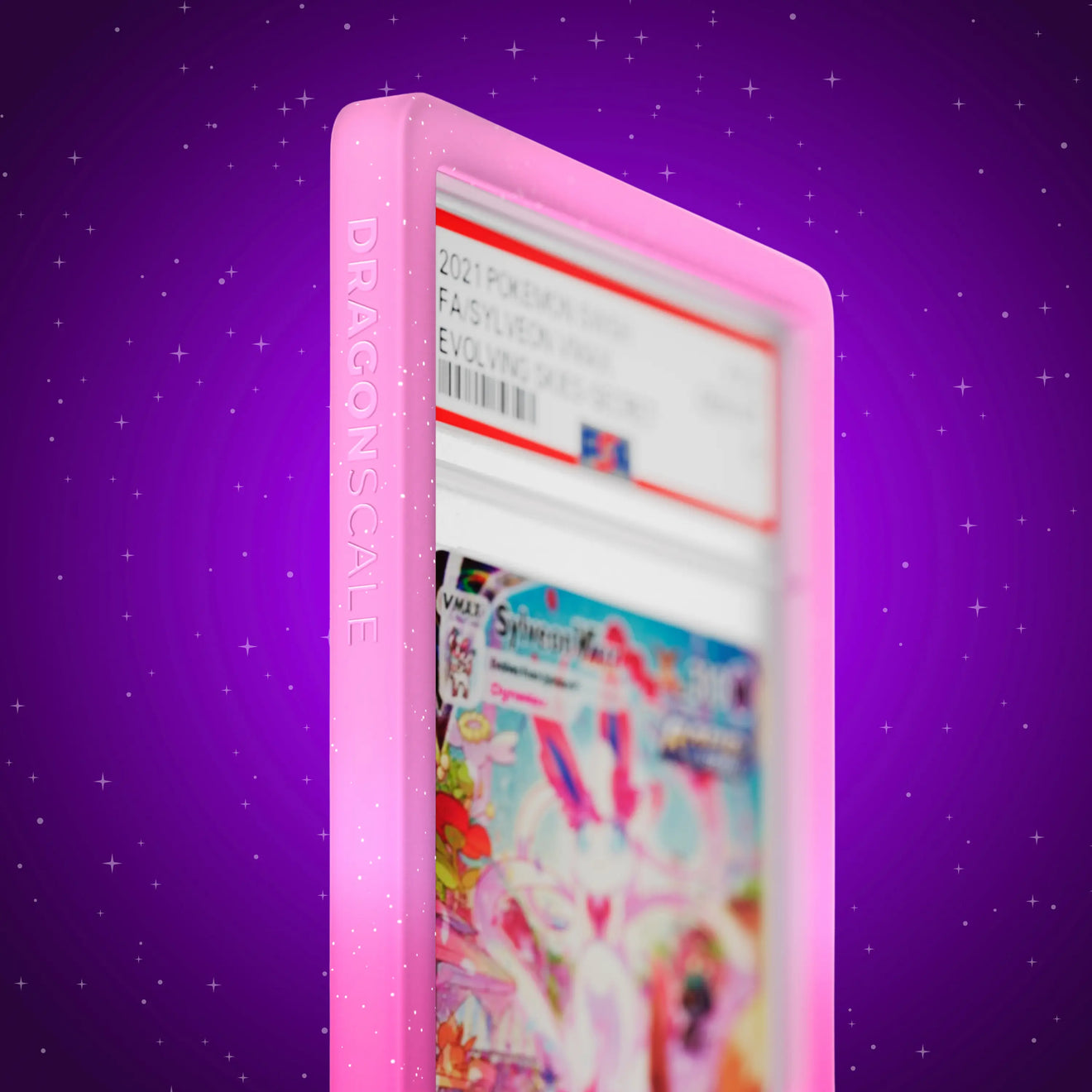 Close up logo zoom view of a PSA slab in Radiant Charm Dragonscale bumper guard, featuring a Sylveon VMAX Evolving Skies PSA 10 Pokemon card.
