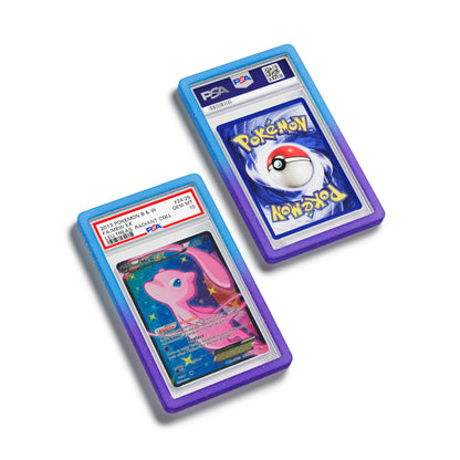 Top-down flat view of a PSA slab in Radiant Dream Dragonscale bumper guard, featuring a Mew ex Legendary Treasures PSA 10 Pokemon card.
