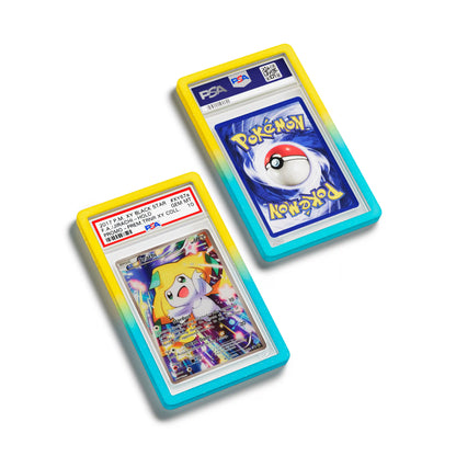 Top-down flat view of a PSA slab in Radiant Wish Dragonscale bumper guard, featuring a Jirachi Alternate Art Promos PSA 10 Pokemon card.
