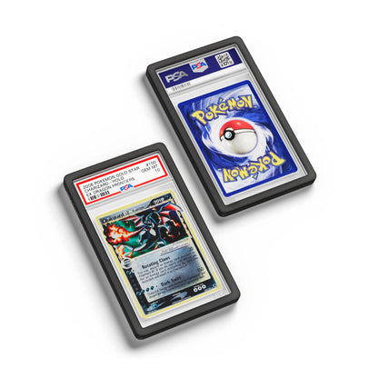 Top-down flat view of a PSA slab in Solid Black Dragonscale bumper guard, featuring a Charizard Gold Star Ex Dragon Frontiers PSA 10 Pokemon card.
