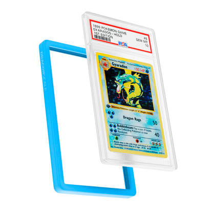 Display and demo view of a PSA slab in Solid Cyan Dragonscale bumper guard, featuring a Gyrados 1st Edition Base Set PSA 10 Pokemon card.