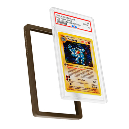 Display and demo view of a PSA slab in Solid Brown Dragonscale bumper guard, featuring a Machamp 1st Edition Base Set PSA 10 Pokemon card.