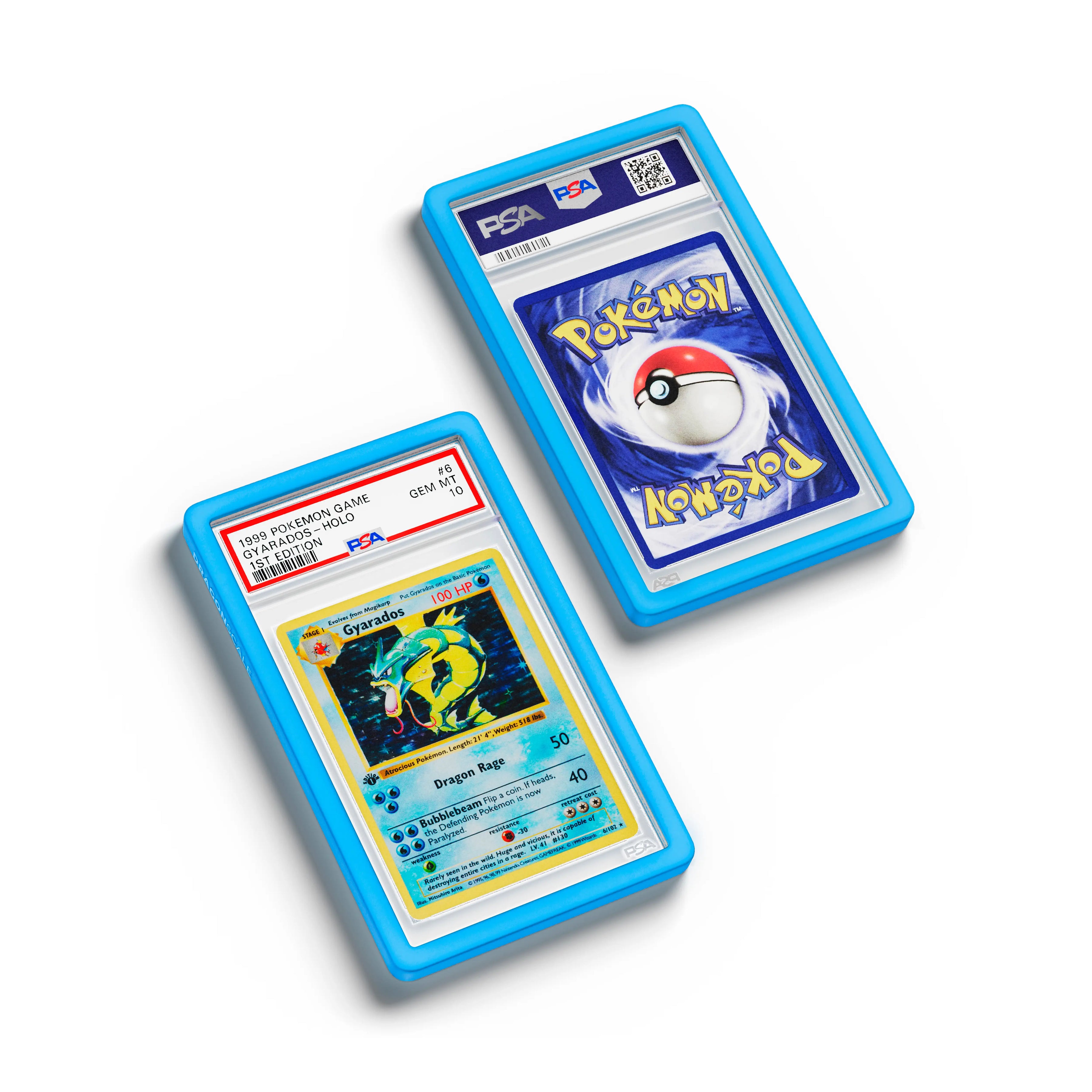 Top-down flat view of a PSA slab in Solid Cyan Dragonscale bumper guard, featuring a Gyrados 1st Edition Base Set PSA 10 Pokemon card.