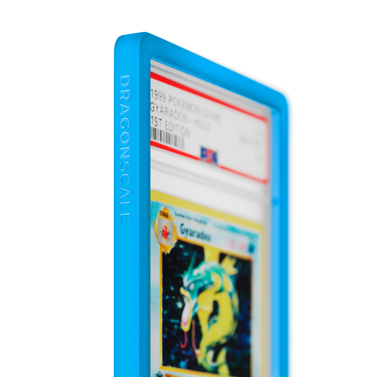 Close up logo zoom view of a PSA slab in Solid Cyan Dragonscale bumper guard, featuring a Gyrados 1st Edition Base Set PSA 10 Pokemon card.