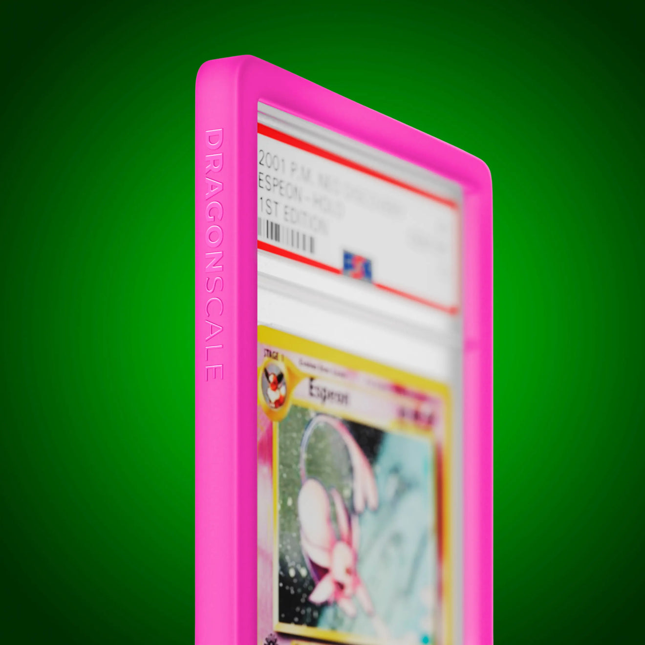 Close up logo zoom view of a PSA slab in Solid Pink Dragonscale bumper guard, featuring a Espeon Neo Genesis PSA 10 Pokemon card.