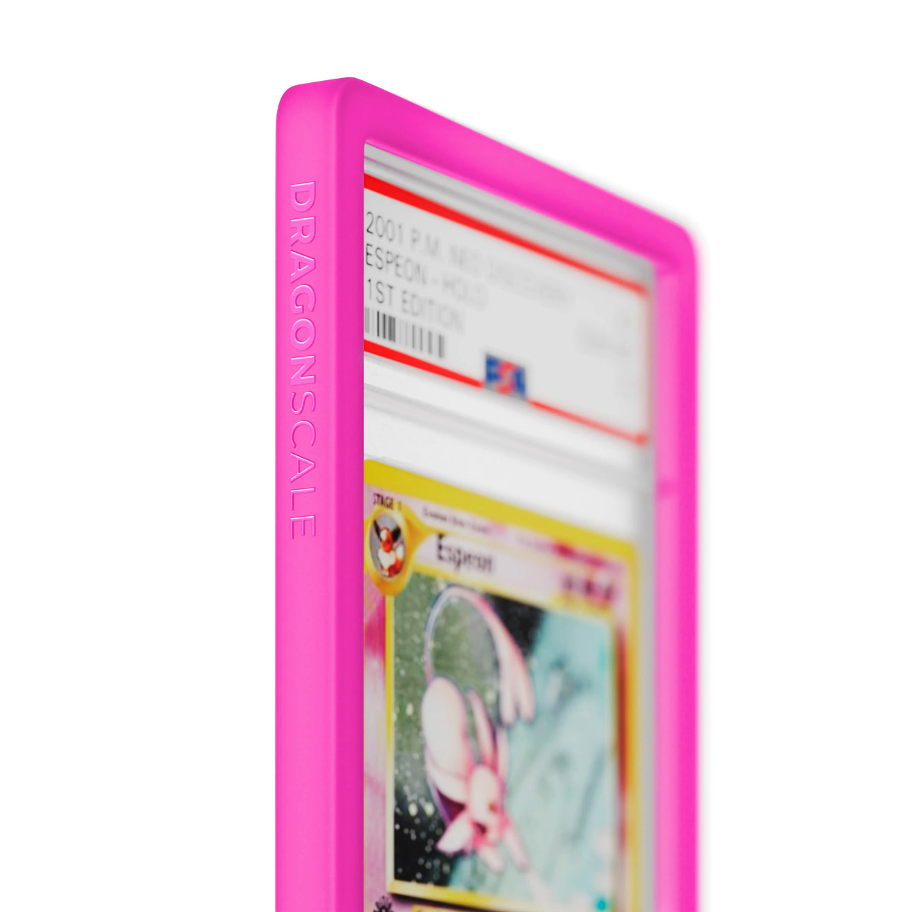 Close up logo zoom view of a PSA slab in Solid Pink Dragonscale bumper guard, featuring a Espeon Neo Genesis PSA 10 Pokemon card.