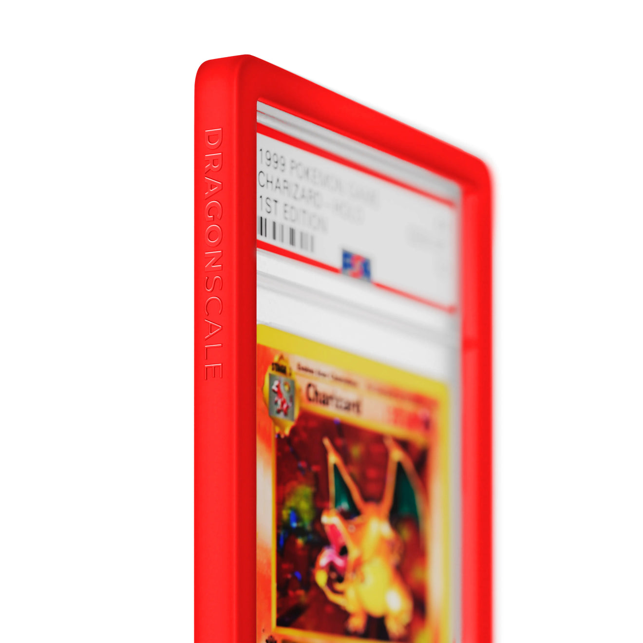 Close up logo zoom view of a PSA slab in Solid Red Dragonscale bumper guard, featuring a Charizard 1st Edition Base Set PSA 10 Pokemon card.