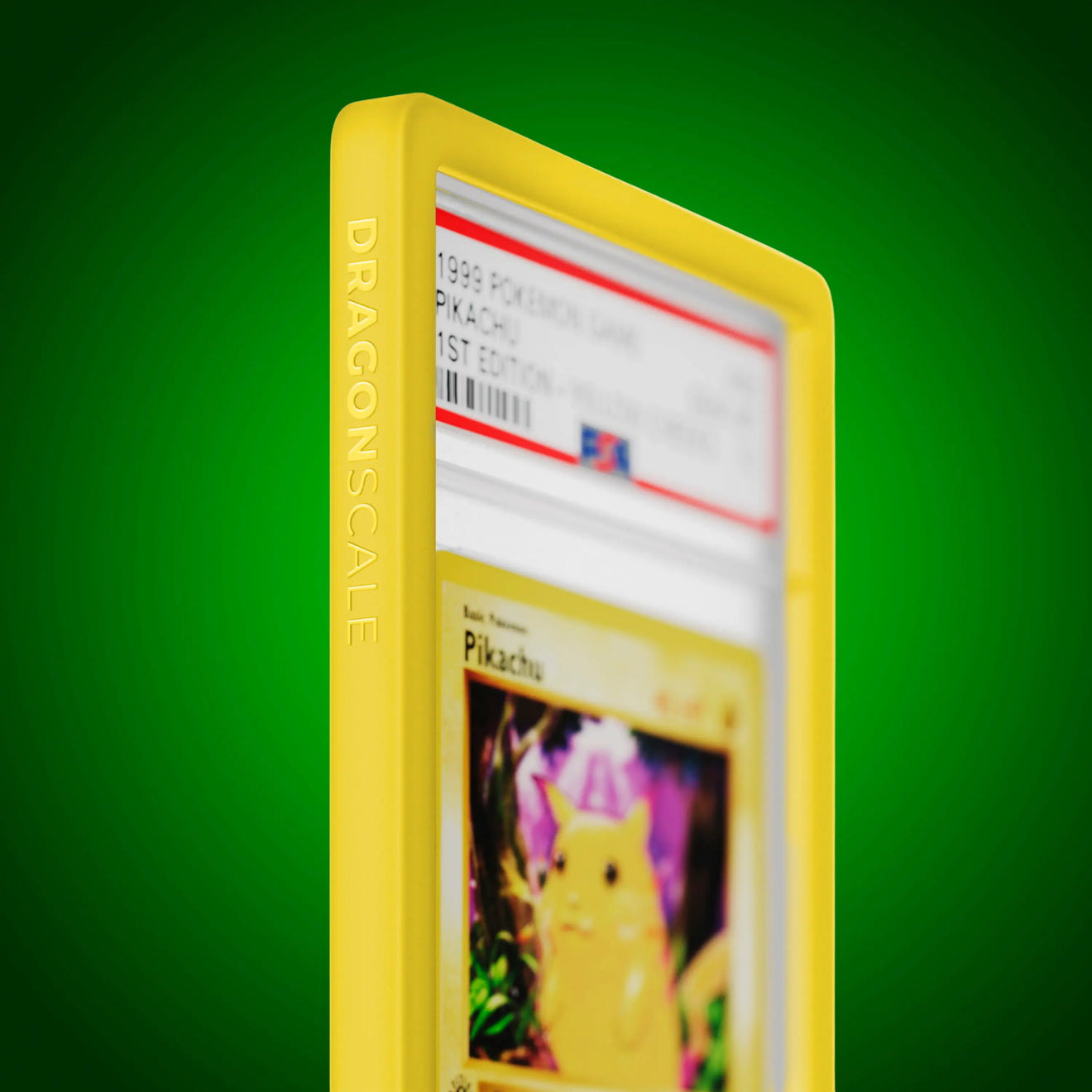 Close up logo zoom view of a PSA slab in Solid Yellow Dragonscale bumper guard, featuring a Pikachu 1st Edition Base Set PSA 10 Pokemon card.