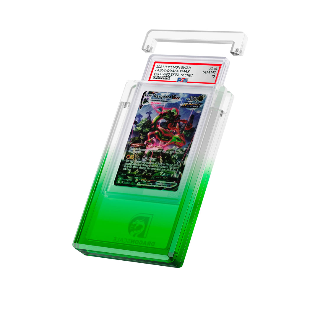 Angled display and demo view of the Dragonscale Wyrmgem Myst Emerald acrylic case, highlighting the acrylic lid and secure magnetic locks featuring a Rayquaza VMAX Evolving Skies PSA 10 Pokemon card.