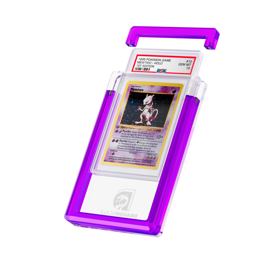 Angled display and demo view of the Dragonscale Wyrmgem Solid Amethyst acrylic case, highlighting the acrylic lid and secure magnetic locks featuring a Mewtwo 1st Edition Base Set PSA 10 Pokemon card.