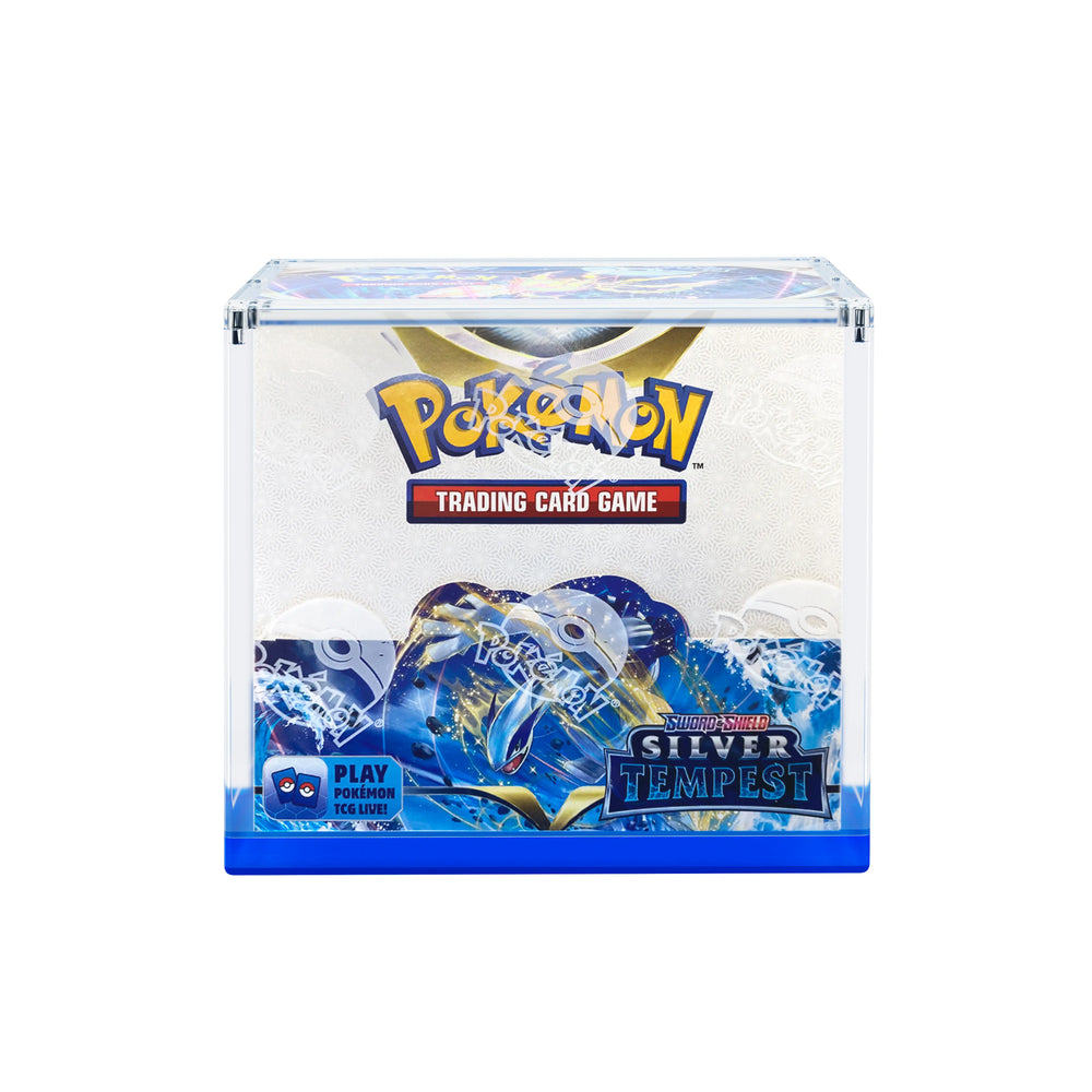 Front-facing view of an enclosed Dragonscale WyrmPrism AB140 Blue Sapphire acrylic case with a clear lid and solid black base holding a Pokémon Sword & Shield—Silver Tempest booster box.
