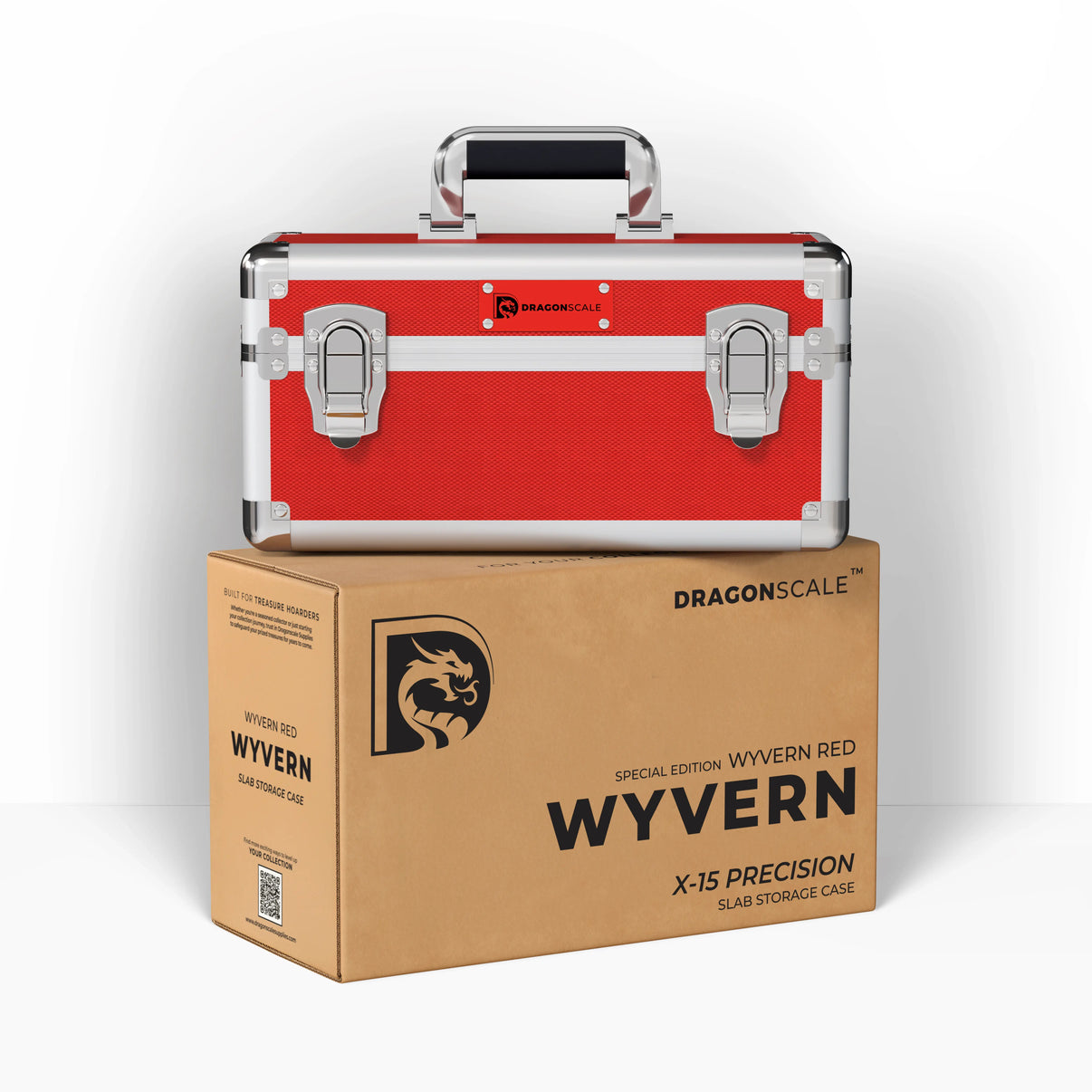 Display and demo view of the Dragonscale Wyvern X-15 Precision metal slab case in ruby red, placed on top of its branded cardboard packaging box.