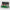 Open view of the Dragonscale X-15 Precision metal slab case in emerald green holding 15 PSA slabs with Dragonscale guards.