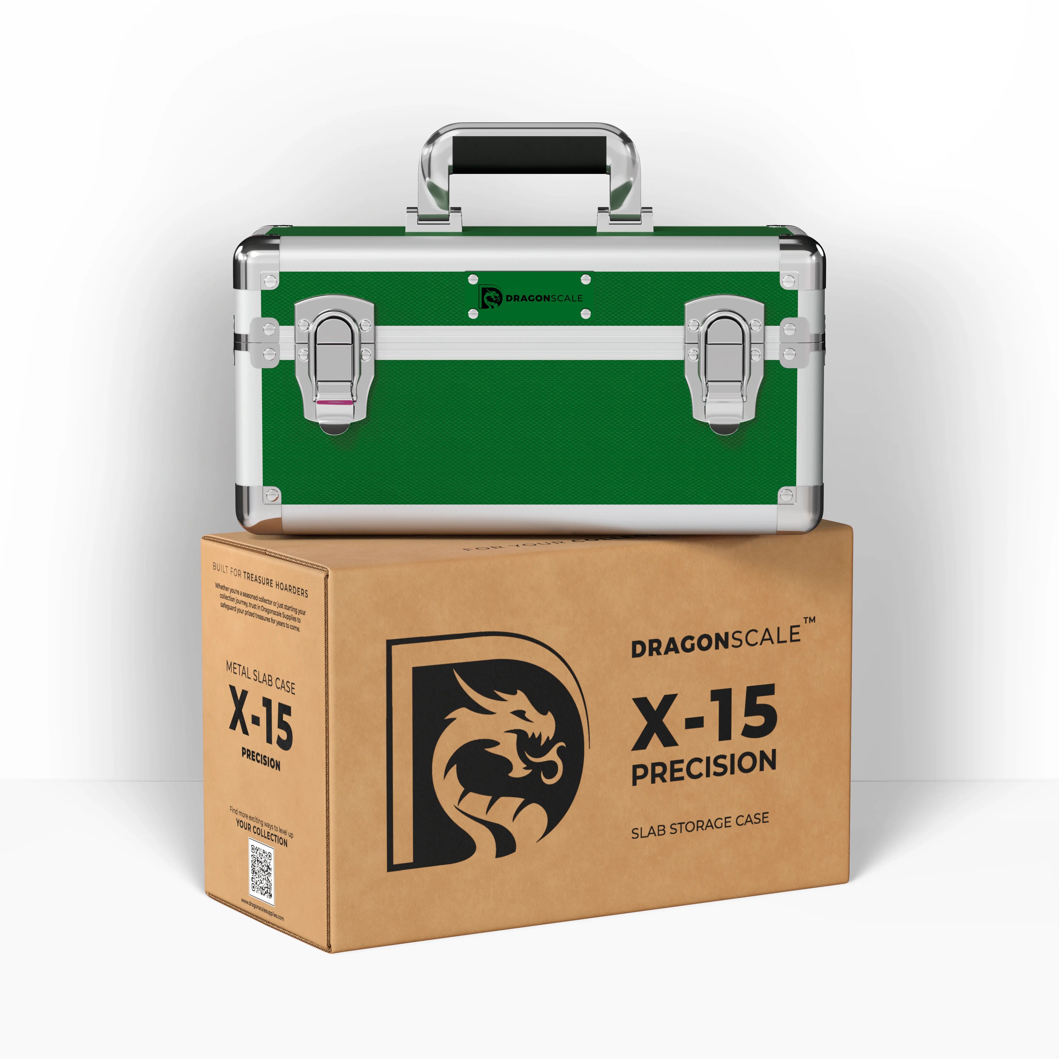 Display and demo view of the Dragonscale X-15 Precision metal slab case in emerald green, placed on top of its branded cardboard packaging box.